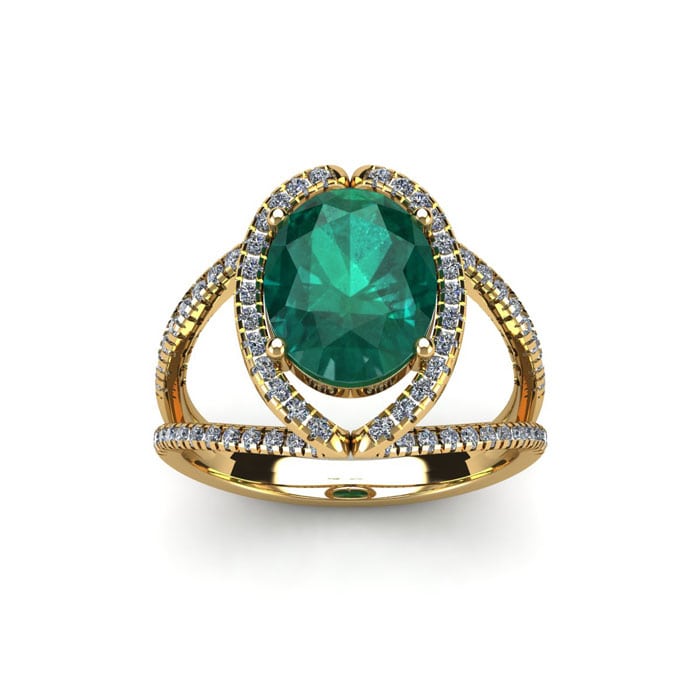 1 1/2 Carat Oval Shape Emerald and Halo Diamond Ring In 14 Karat Yellow Gold

