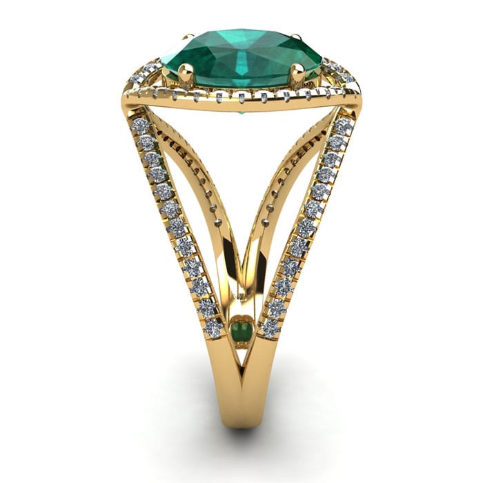 1 1/2 Carat Oval Shape Emerald and Halo Diamond Ring In 14 Karat Yellow Gold
