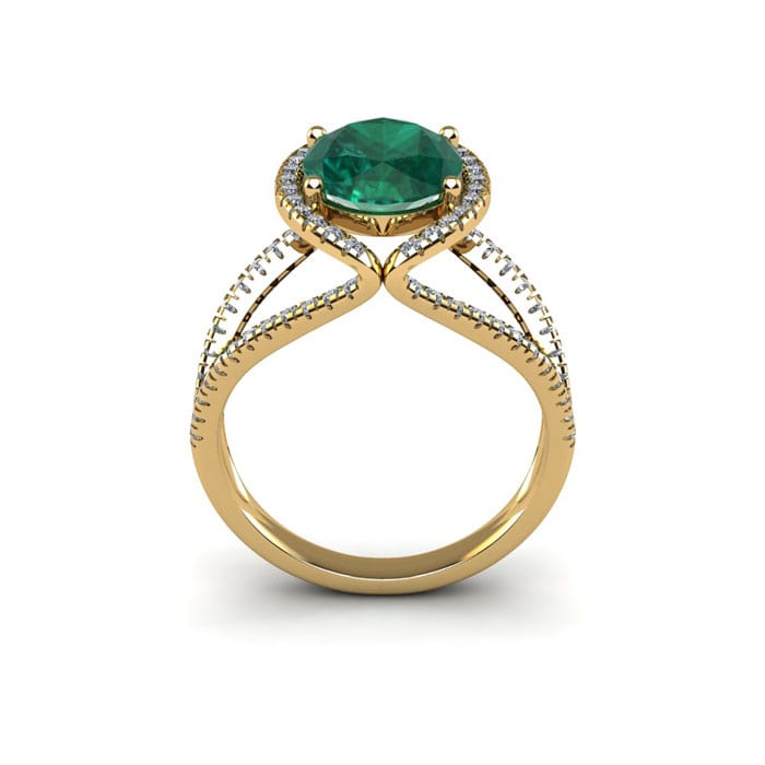 1 1/2 Carat Oval Shape Emerald and Halo Diamond Ring In 14 Karat Yellow Gold
