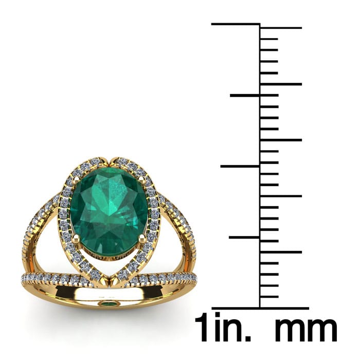 1 1/2 Carat Oval Shape Emerald and Halo Diamond Ring In 14 Karat Yellow Gold

