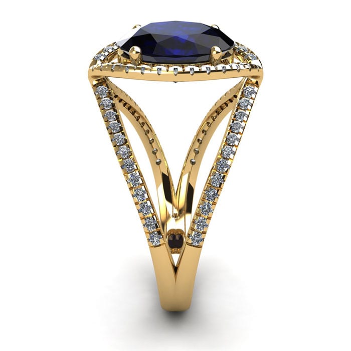 2 Carat Oval Shape Sapphire and Halo Diamond Ring In 14 Karat Yellow Gold
