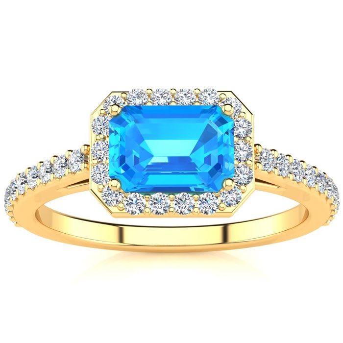 1 1/2 Carat Blue Topaz and Halo Diamond Ring In 14 Karat Yellow Gold