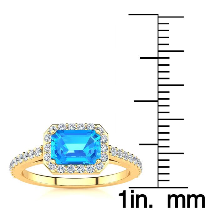 1 1/2 Carat Blue Topaz and Halo Diamond Ring In 14 Karat Yellow Gold