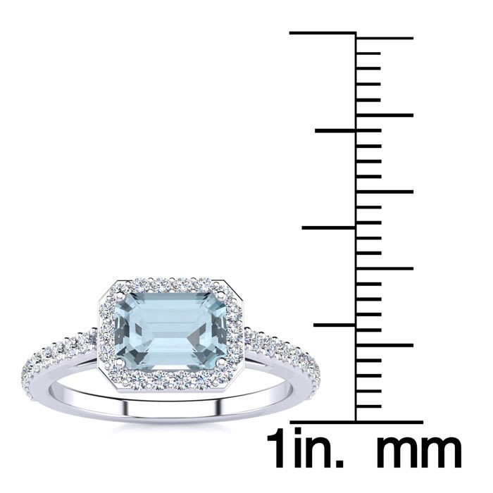 Aquamarine Ring: Aquamarine Jewelry: 1 1/4 Carat Aquamarine and Halo Diamond Ring In 14 Karat White Gold