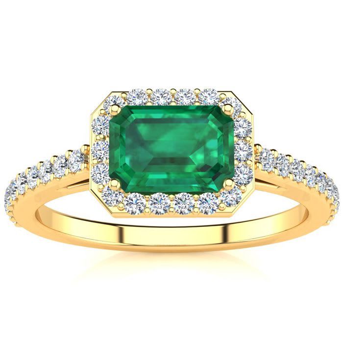 1 1/4 Carat Emerald and Halo Diamond Ring In 14 Karat Yellow Gold