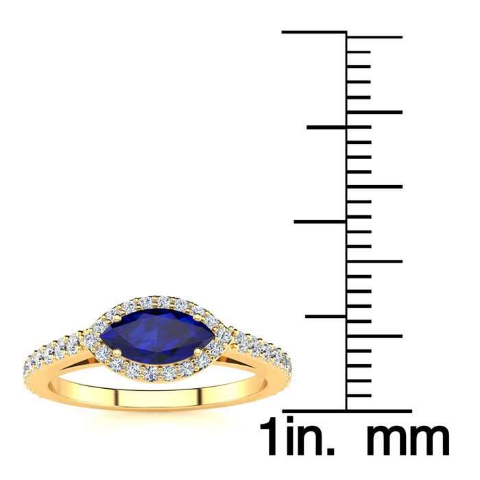 1 Carat Marquise Shape Sapphire and Halo Diamond Ring In 14 Karat Yellow Gold