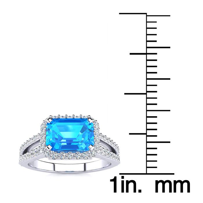 1 1/2 Carat Antique Blue Topaz and Halo Diamond Ring In 14 Karat White Gold