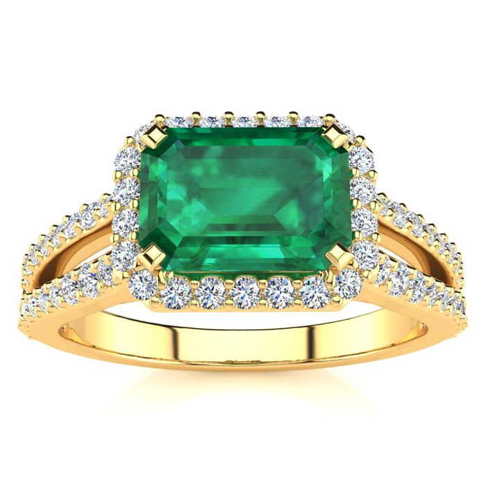 1 1/3 Carat Antique Emerald and Halo Diamond Ring In 14 Karat Yellow Gold