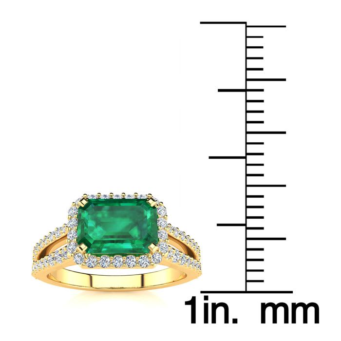 1 1/3 Carat Antique Emerald and Halo Diamond Ring In 14 Karat Yellow Gold