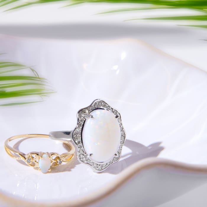 5 Carat Opal Ring with Halo Diamonds In 14 Karat White Gold