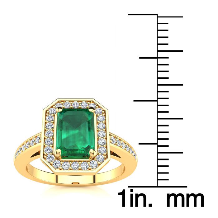 1 Carat Emerald and Halo Diamond Ring In 14 Karat Yellow Gold