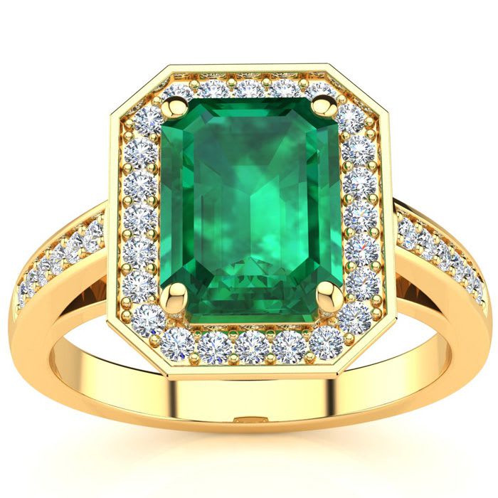 1 3/4 Carat Emerald and Halo Diamond Ring In 14 Karat Yellow Gold