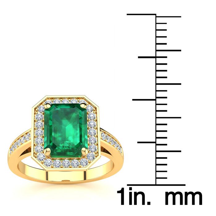 1 3/4 Carat Emerald and Halo Diamond Ring In 14 Karat Yellow Gold