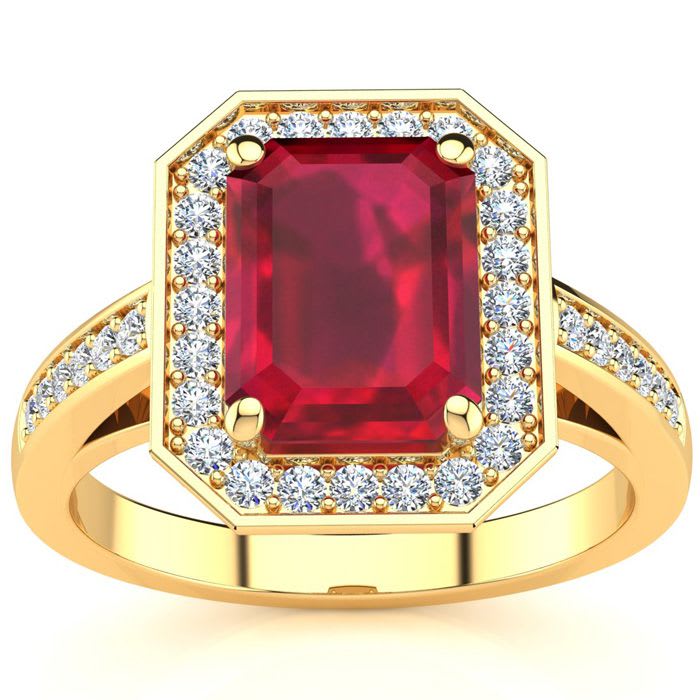3 1/3 Carat Ruby and Halo Diamond Ring In 14 Karat Yellow Gold