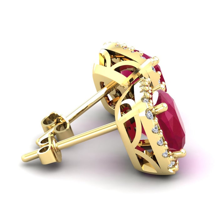 6 3/4 Carat Cushion Cut Ruby and Halo Diamond Stud Earrings In 14 Karat Yellow Gold