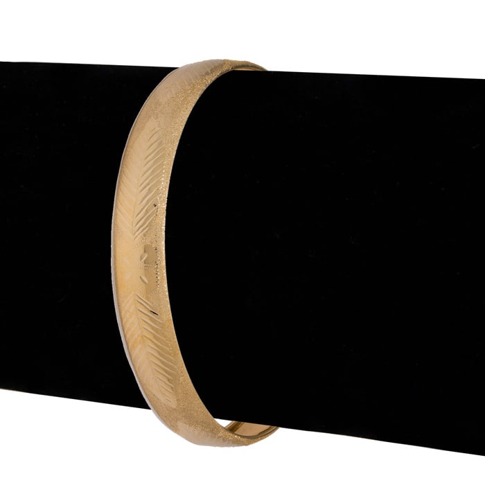 10K Yellow Gold Flexible Bangle Bracelet With Bow and Leaves Diamond Cut Design, 7 Inches