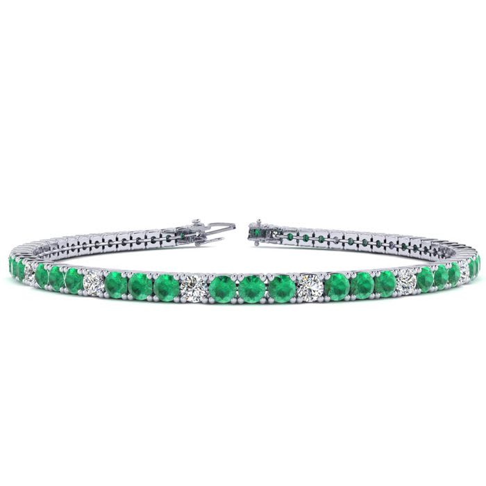 4 1/3 Carat Emerald And Diamond Graduated Tennis Bracelet In 14 Karat White Gold, 7 Inches