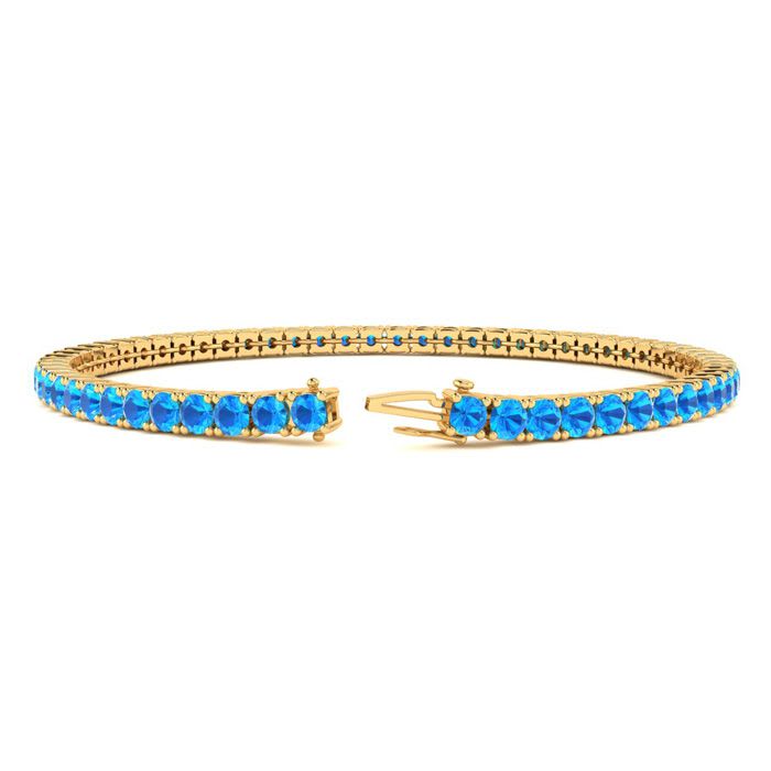 4 3/4 Carat Blue Topaz Tennis Bracelet In 14 Karat Yellow Gold, 6 1/2 Inches