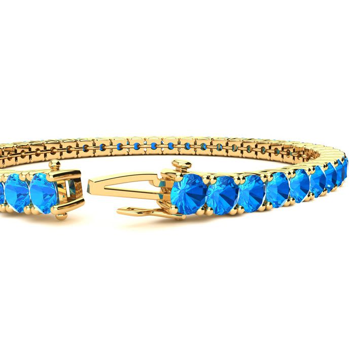 14 Carat Blue Topaz Tennis Bracelet In 14 Karat Yellow Gold, 8 1/2 Inches