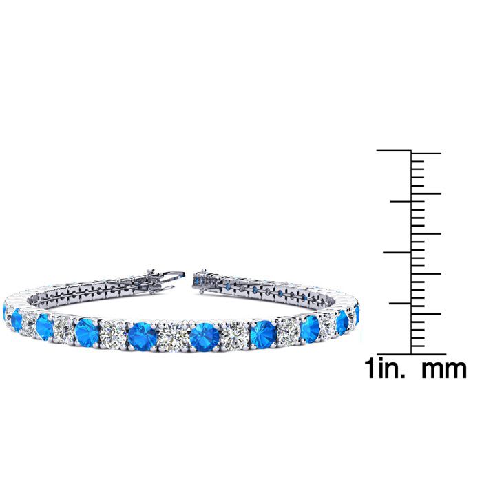 10 1/3 Carat Blue Topaz and Diamond Tennis Bracelet In 14 Karat White Gold, 7 Inches