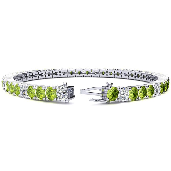 9 1/5 Carat Peridot and Diamond Alternating Tennis Bracelet In 14 Karat White Gold, 7 Inches