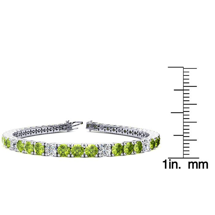 9 1/5 Carat Peridot and Diamond Alternating Tennis Bracelet In 14 Karat White Gold, 7 Inches