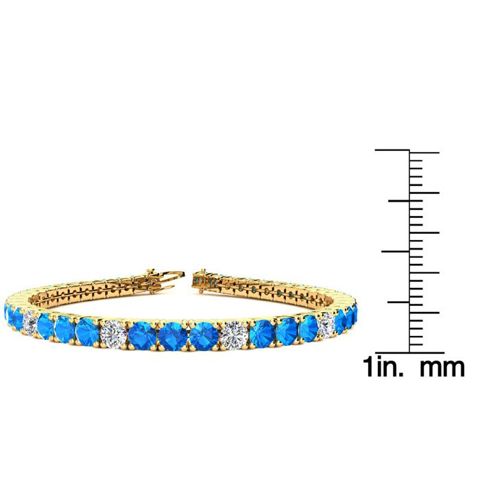 14 Carat Blue Topaz and Diamond Alternating Tennis Bracelet In 14 Karat Yellow Gold, 9 Inches