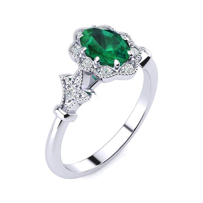 1 Carat Oval Shape Emerald and Halo Diamond Vintage Ring In 14 Karat White Gold