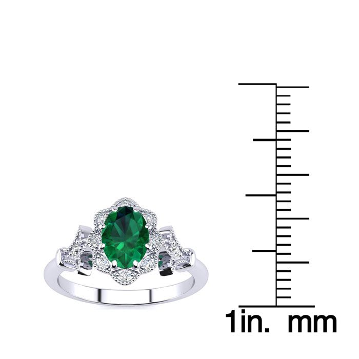 1 Carat Oval Shape Emerald and Halo Diamond Vintage Ring In 14 Karat White Gold