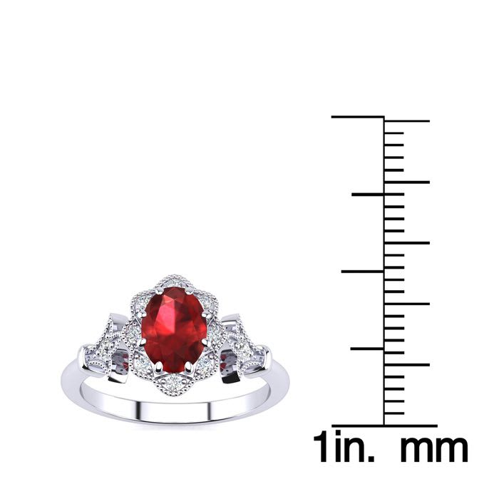 1 Carat Oval Shape Ruby and Halo Diamond Vintage Ring In 14 Karat White Gold