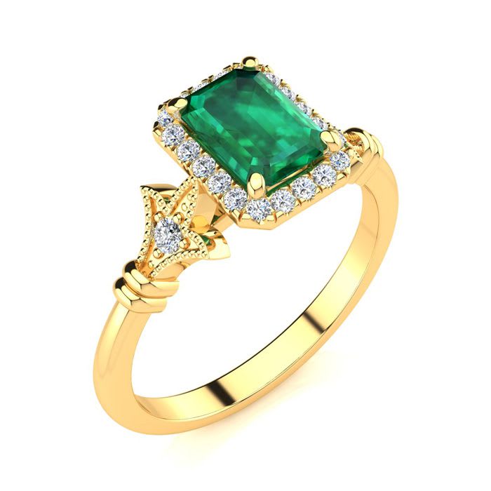 1 Carat Emerald and Halo Diamond Vintage Ring In 14 Karat Yellow Gold