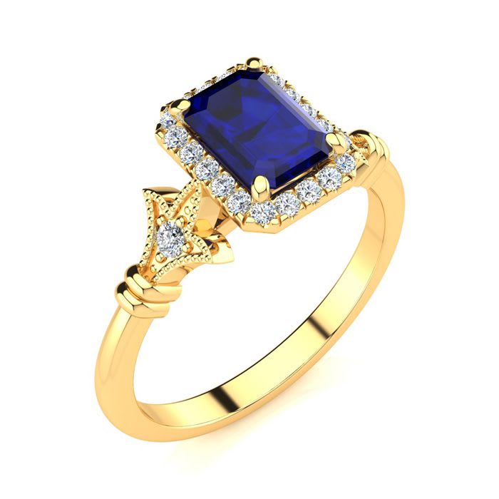 1 1/2 Carat Sapphire and Halo Diamond Vintage Ring In 14 Karat Yellow Gold