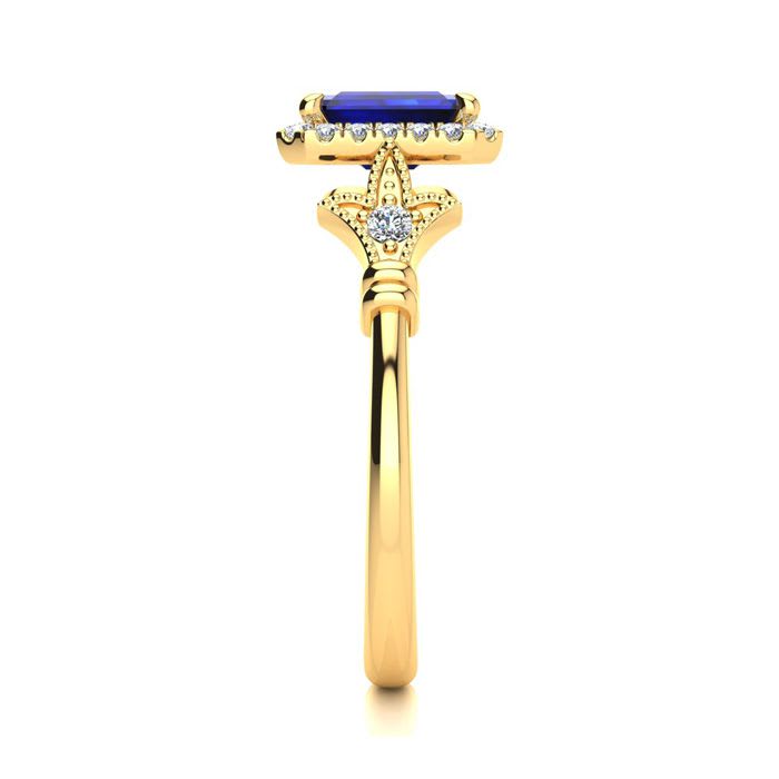 1 1/2 Carat Sapphire and Halo Diamond Vintage Ring In 14 Karat Yellow Gold