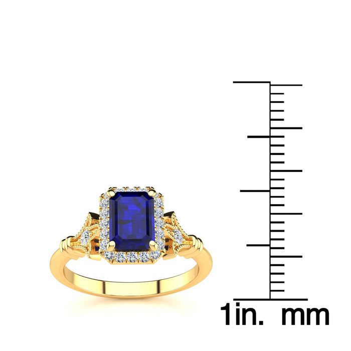 1 1/2 Carat Sapphire and Halo Diamond Vintage Ring In 14 Karat Yellow Gold