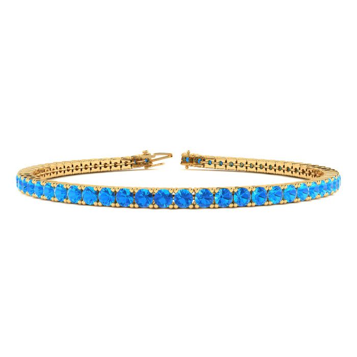 5 Carat Blue Topaz Tennis Bracelet In 14 Karat Yellow Gold, 9 Inches