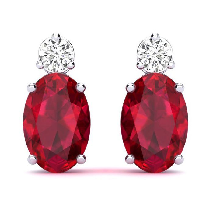 1 Carat Oval Ruby and Diamond Stud Earrings In 14 Karat White Gold