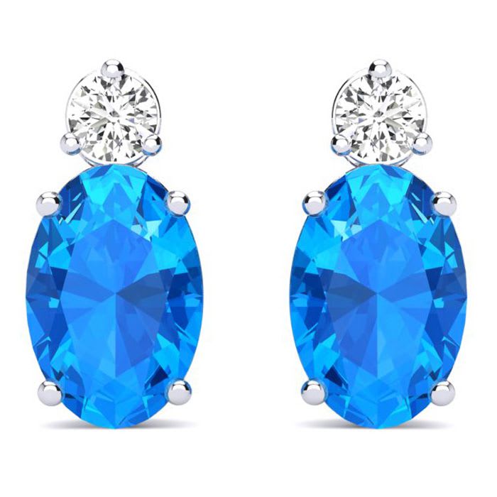 2 Carat Oval Blue Topaz and Diamond Stud Earrings In 14 Karat White Gold
