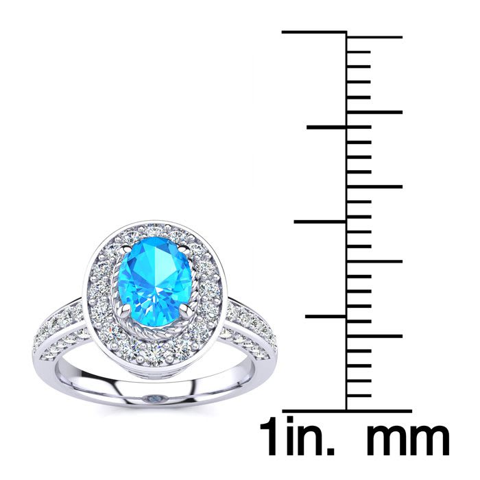 1 2/3 Carat Oval Shape Blue Topaz and Halo Diamond Ring In 14 Karat White Gold