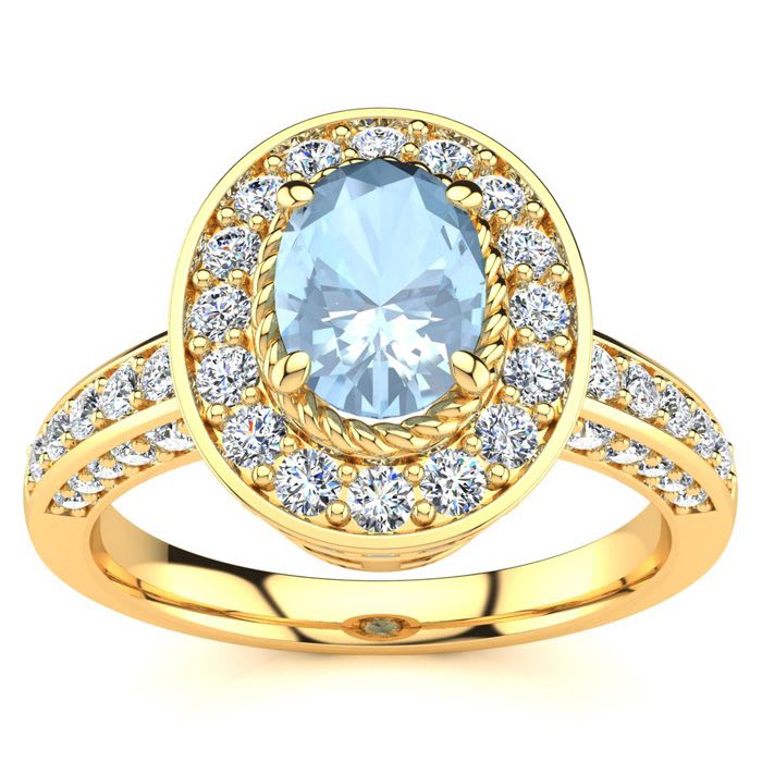 Aquamarine Ring: Aquamarine Jewelry: 1 1/2 Carat Oval Shape Aquamarine and Halo Diamond Ring In 14 Karat Yellow Gold