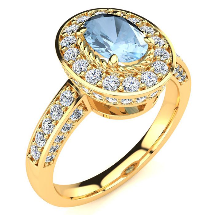 Aquamarine Ring: Aquamarine Jewelry: 1 1/2 Carat Oval Shape Aquamarine and Halo Diamond Ring In 14 Karat Yellow Gold