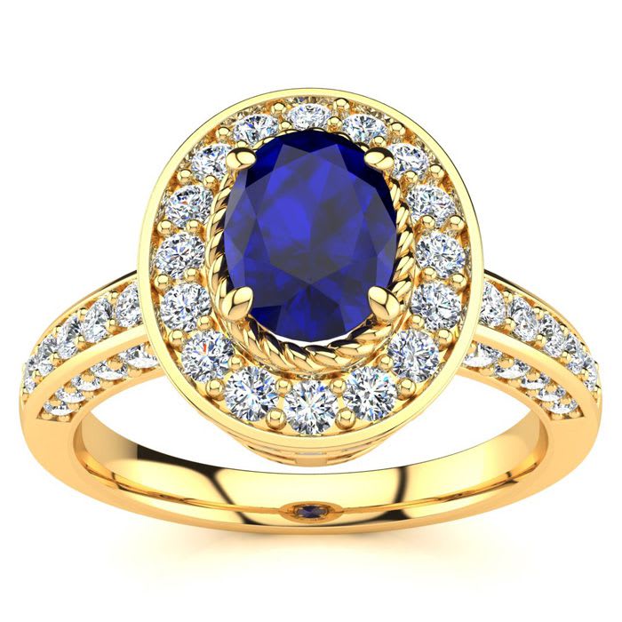 1 2/3 Carat Oval Shape Sapphire and Halo Diamond Ring In 14 Karat Yellow Gold