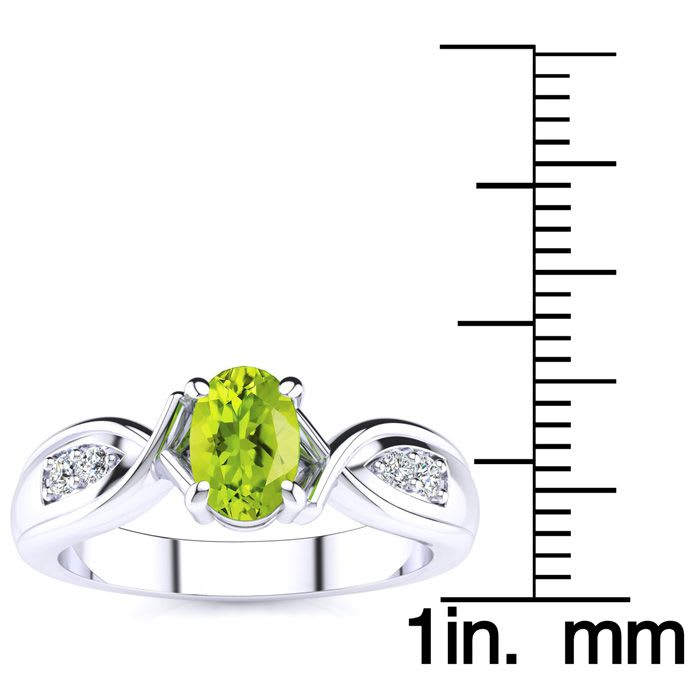1 Carat Oval Shape Peridot and Four Diamond Ring In 10 Karat White Gold