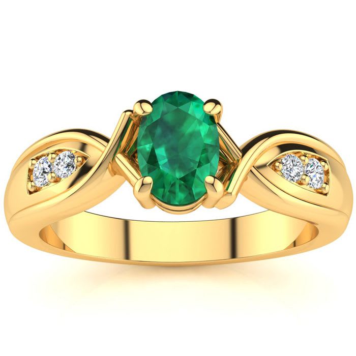 1 Carat Oval Shape Emerald and Four Diamond Ring In 10 Karat Yellow Gold