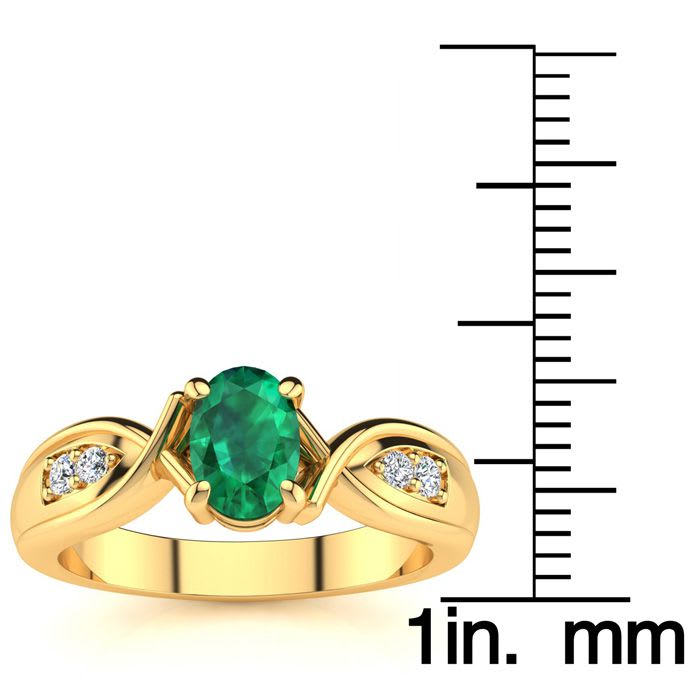 1 Carat Oval Shape Emerald and Four Diamond Ring In 10 Karat Yellow Gold