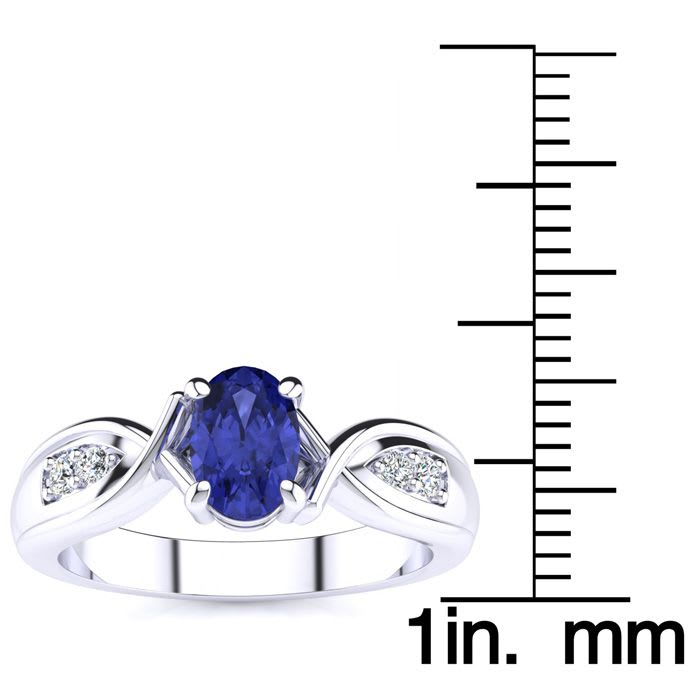 1 Carat Oval Shape Tanzanite and Four Diamond Ring In 10 Karat White Gold
