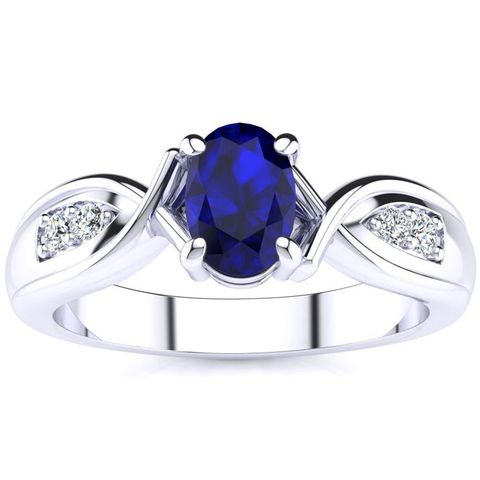 1 Carat Oval Shape Sapphire and Four Diamond Ring In 10 Karat White Gold