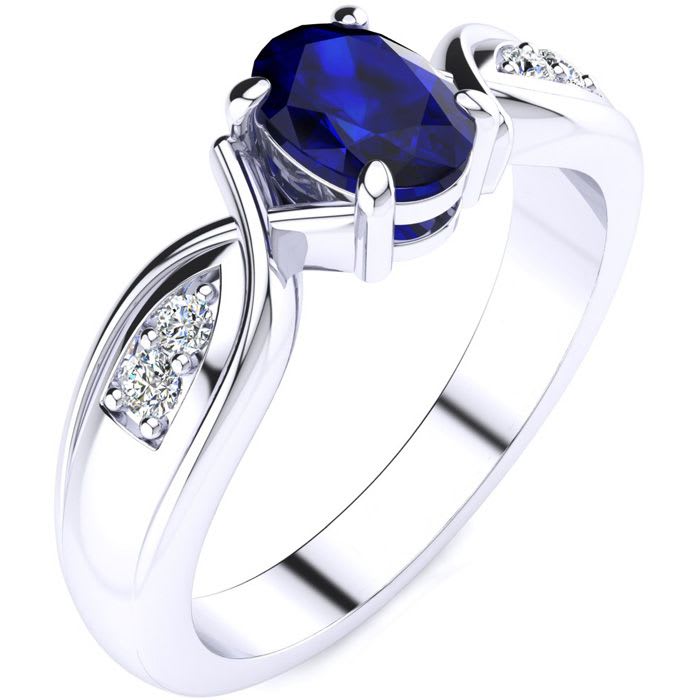 1 Carat Oval Shape Sapphire and Four Diamond Ring In 10 Karat White Gold