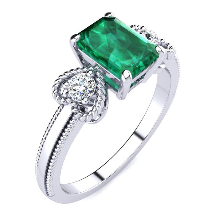 1 Carat Emerald and Two Diamond Heart Ring In 10 Karat White Gold