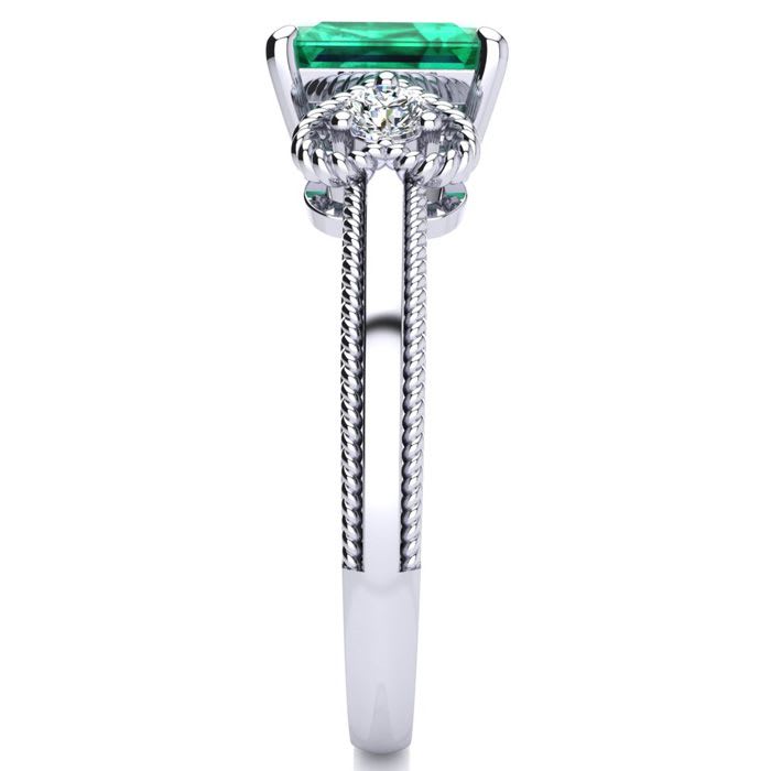1 Carat Emerald and Two Diamond Heart Ring In 10 Karat White Gold