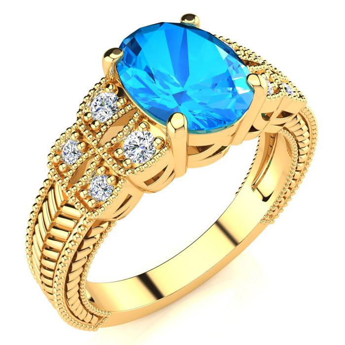 2 1/3 Carat Oval Shape Blue Topaz and Diamond Ring In 10 Karat Yellow Gold